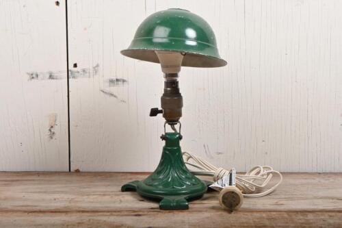 LAMP: A green adjustable desk lamp with cast iron base, tested & in working order