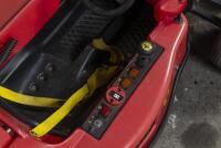 CHILDS CAR: An impressive Italian "Toys Toys" children's battery powered toy car of Alain Prost's 1990 Ferrari F1-90, steel chassis framework with moulded plastic body panels, electric motor, approx 210cm long - 4