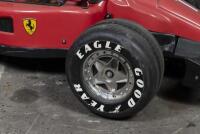 CHILDS CAR: An impressive Italian "Toys Toys" children's battery powered toy car of Alain Prost's 1990 Ferrari F1-90, steel chassis framework with moulded plastic body panels, electric motor, approx 210cm long - 5
