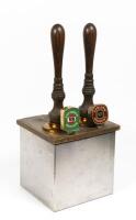 BEER TAP: A pair of draught beer taps on stainless steel base, with Carlton Draught an Victoria Beer decals, 62cm high overall