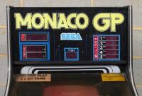 SEGA: A circa 1980 Japanese Sega "Monaco GP" upright single player arcade video game, 145cm high, sound appears to be working, screen is on but is temperamental, pedal appears to work, steering wheel rotates but has no effect, electrical points have oxidi - 2