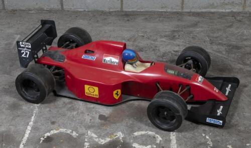 FERRARI: A 1:5 scale radio controlled F1 car in Ferrari livery with whipper snipper engine, 110cm long
