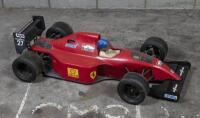 FERRARI: A 1:5 scale radio controlled F1 car in Ferrari livery with whipper snipper engine, 110cm long
