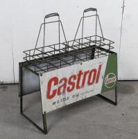 CASTROL: A circa 1960s Castrol Motor Oil bottle stand and two bottle racks, painted sign to both sides, holds 12 bottles, 84cm high, 75cm wide, 38cm deep overall