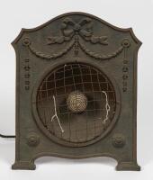 HEAT LAMP: A vintage cast iron heat lamp with bowed ribbon and swag decoration, 43cm high, unknown working condition