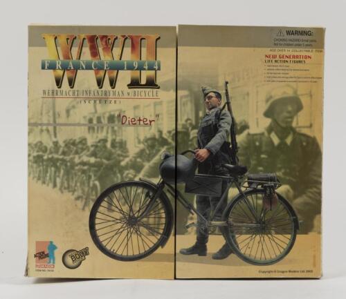 ACTION FIGURE: A Dragon models 1/6th scale WWII France 1944 Wehrmacht Infantryman action figure with model bicycle