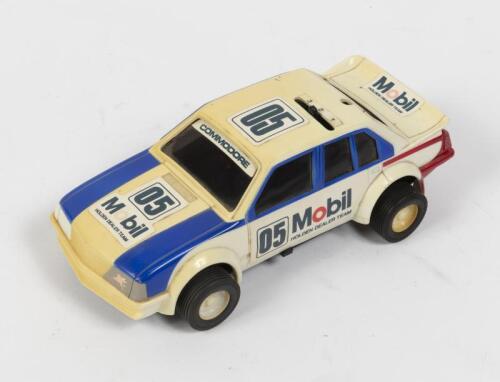 HOLDEN: A battery operated model of a Holden Commodore in 05 Peter Brock livery, 20 cm long, untested
