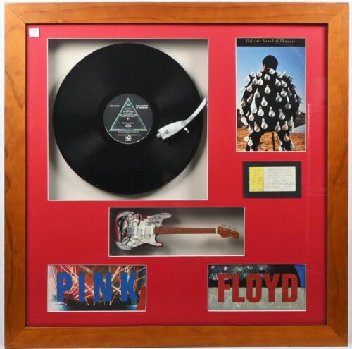 PINK FLOYD: A framed and glazed 'Pink Floyd' themed collage including 'Pink Floyd - Dark Side of The Moon' record, miniature guitar and 1988 World Tour Ticket - Sydney Australia