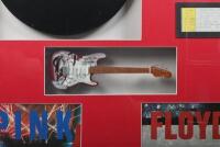 PINK FLOYD: A framed and glazed 'Pink Floyd' themed collage including 'Pink Floyd - Dark Side of The Moon' record, miniature guitar and 1988 World Tour Ticket - Sydney Australia - 2