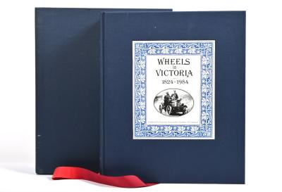 VICTORIA: 'WHEELS IN VICTORIA 1824-1984' limited edition blue cloth hardcover book. Numbered '3181' of 4000 copies. Signed by editors Harold Paynting and Malcolm Grant