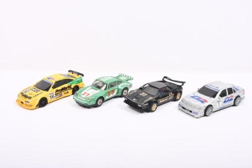 GERMAN CARS: Four Hornby&nbsp;Hobbies and SCALEXTRIC slot cars based on German cars. BMW, Mercedes-Benz, Porsche & Opel Slot Cars