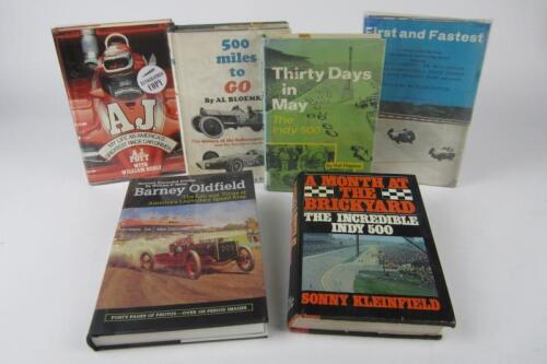 AMERICAN RACING: A group hardcover books detailing American racing. A.J Foyt signature