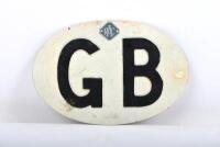 RAC GB: A Royal Automobile Club GB car plate, white oval plate with black lettering, 18cm across