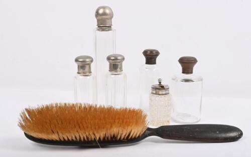 BOTTLES: A collection of gentleman's vanity bottles, together with clothes brush