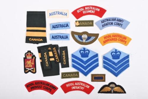MILITARY: A collection of fabric military badges of various regiments and nationalities