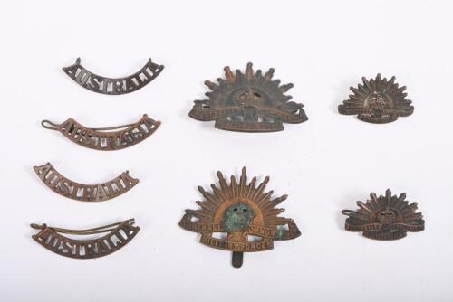 WWII BADGES: Eight Australian WWII brass badges including four rising sun motif badges