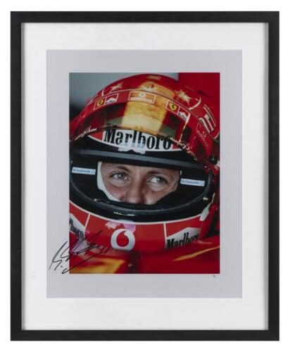 SCHUMACHER: A 2005 1/1 colour image of Michael Schumacher with helmet as produced by Lab X Images. CoA. Michael Schumacher signature