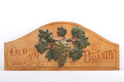 PUB SIGN: A decorative reproduction timber and resin over bar English pub style sign for 'Old Brown Brandy', 26.5cm high, 61cm wide