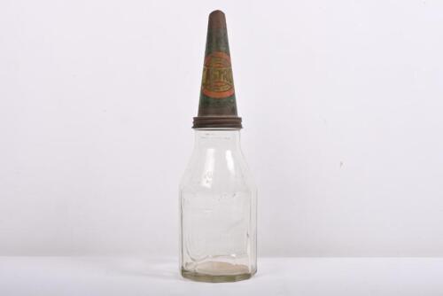 CASTROL WAKEFIELD: An early Castrol Wakefield one imperial embosed quart bottle with&nbsp;matching early tin top