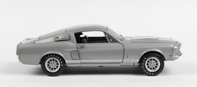 FORD: ,A 1:18 scale ERTL Ford Mustang. Silver with white G.T stripe