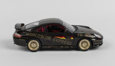 PORSCHE: A 1:18 scale Bburago Porsche 911 Carrera (1997) in brown