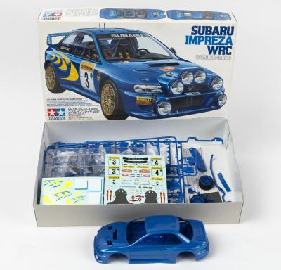 SUBARU: A 1:24 scale TAMIYA SUBARU IMPREZA WRC (SERIES NO.199) plastic model kit