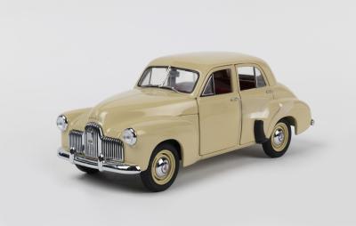 HOLDEN: A TRAX 1:24 scale Holden 48-215 or FX (TX-020) in Burnley cream. Numbered '12706'