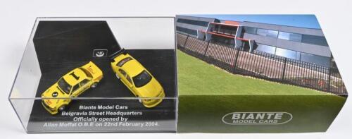 BIANTE: A two piece presentation set by Biante of a BA Ford Falcon in race trim and XD Falcon in "Federation Insurance" livery commemorating the opening of Biante new headquarters. Outer sleeve signed by Allan Moffat