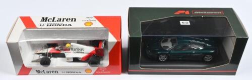 McLAREN: Two 1:43 scale McLaren models. Paul's Model Art/MINICHAMPS McLaren F1 roadcar in metallic green & ONYX McLaren HONDA MP 4/5 as raced by Ayrton Senna (Ref. 021)