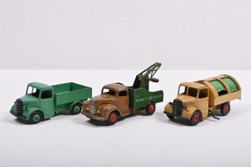 DINKY TOYS: A group of three Dinky Toys commercial trucks. Dinky No.25V/252 Bedford Refuse Wagon, Dinky No.25W/411 Bedford Truck & Dinky No. 430 Commer Breakdown Lorry