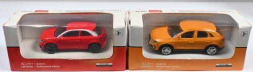 AUDI: Two RASTAR 1:43 scale Audi models