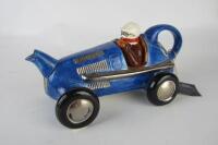 TONY CARTER TEAPOT: An English made&nbsp;Tony Carter racing car porcelain teapot. Numbered 132/2000