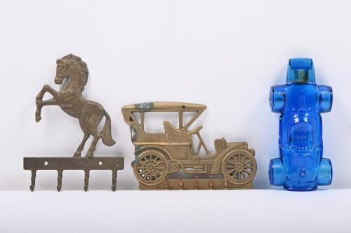AUTOMOBILE: Three automobile related items. Brass hooks & Avon blue glass dispenser