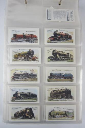 CIGARETTE CARDS: An extensive album containing train cigarette cards (over 200 cards)