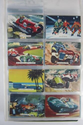 CIGARETTE CARDS: An album containing transport themed cigarette cards
