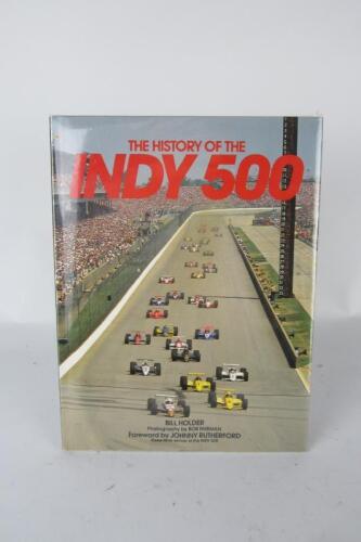 INDY 500: 'The History Of The Indy 500' hardcover book. Multiple Indy 500 driver signatures including Jack Brabham, Al Unser Jnr, Bobby Rahal
