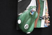 A wonderful 3D mixed media hanging artwork featuring a Jaguar D-Type at Le Mans, stretched canvas with applied styrofoam, 91cm high, 60cm wide, 23cm deep. By automotive artist Terry Lawrie - 2
