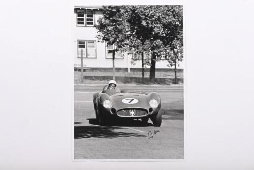 MOSS: A reproduced black and white image of Stirling Moss racing a Maserati 300S at 1956 Australian Tourist Trophy, Albert Park, VIC. Stirling Moss signature