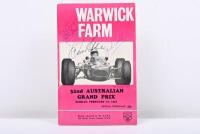 1967 AGP: A 'Sunday, February 19, 1967 WARWICK FARM, 32nd AUSTRALIAN GRAND PRIX' Official Programme. Front cover signed by Sir Jack Brabham, Denis Hulme & Jackie Stewart