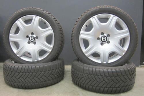 BENTLEY CONTINENTAL: A set of 4 near new Bentley wheels fitted with Dunlop snow tyres
