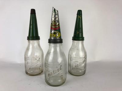 CASTROL WAKEFIELD: Three embossed glass with tin pourer oil bottles