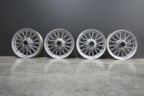 WIRE WHEELS: Four 15 x 4 48 spoke wire wheels