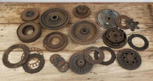 CLUTCHES: A collection of various motorcycle clutches and back wheel drums
