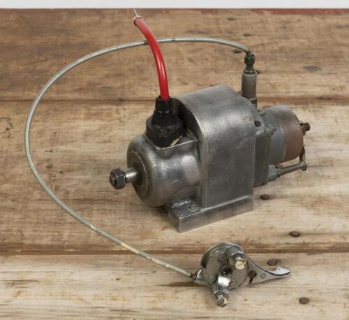 MAGNETO: A single-cylinder Lucas magneto with attached handle bar advancer