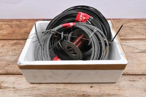 CABLES: A box of uncut cable material and real of copper wire, for break and throttle usage