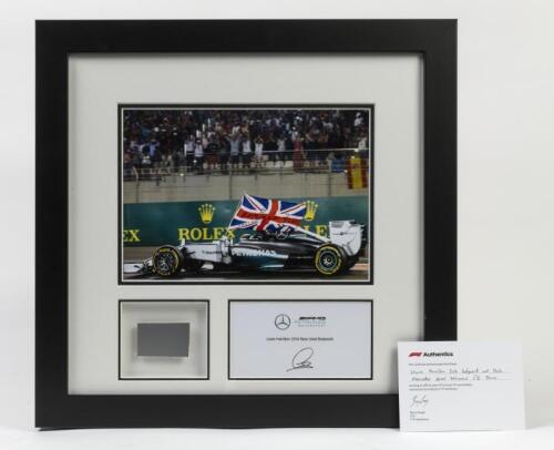 HAMILTON: A colour picture of Lewis Hamilton's 2014 Mercedes-Benz W05 with body work. CoA