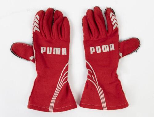 COULTHARD: A pair of red PUMA racing gloves as worn by Fabian Coulthard during the 2016 Virgin Australia Supercars Championship for DJR Team Penske. CoA hand signed by Dick Johnson & Ryan Story