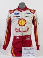 SLADE: A OMP racing suit as worn by Tim Slade during the 2020 Virgin Australia Supercars Championship for DJR Team Penske, Shell V-Power Racing Team. Suit signed by Dick Johnson to front. CoA