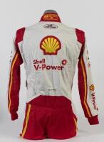 SLADE: A OMP racing suit as worn by Tim Slade during the 2020 Virgin Australia Supercars Championship for DJR Team Penske, Shell V-Power Racing Team. Suit signed by Dick Johnson to front. CoA - 5