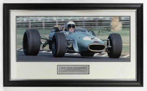 BRABHAM: A colour picture of Sir Jack Brabham racing the Brabham BT-24. Sir Jack Brabham signature